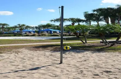 a pole in the sand on a beach at Beautiful 4 beds at Paradise Palms Resort in Kissimmee