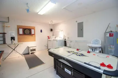 a room with a laboratory with a table in it at Private Pool Home at Seasons Community in Kissimmee