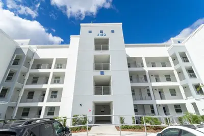 a white building with the number on it at 3BR Resort Condo FREE Waterpark 3150 in Kissimmee