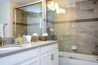 a bathroom with a sink and a shower at Gorgeus HOUSE Near Disney & FREE water park 4963 in Kissimmee