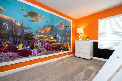 an ocean themed room with an underwater mural at Gorgeus HOUSE Near Disney & FREE water park 4963 in Kissimmee