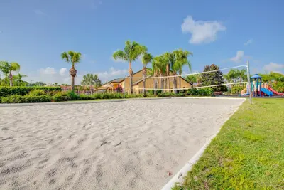a volleyball court with a net on a soccer field at 8960 Cat Palm Road in Kissimmee