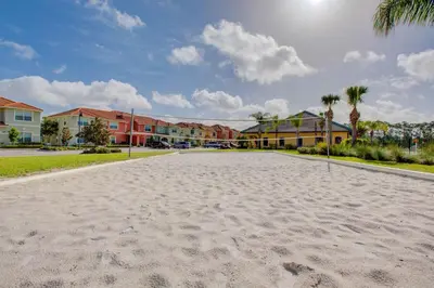 a basketball court in the middle of a street with houses at 8960 Cat Palm Road in Kissimmee
