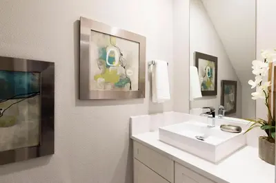 a white bathroom with a sink and a mirror at Fantastic 4 beds Villa 5 min to Disney in Orlando