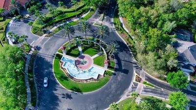 an aerial view of a road with a park at 8536 Crystal Cove in Kissimmee