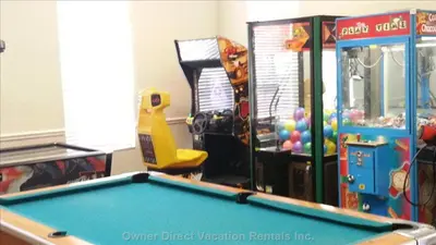 a childrens play room with a pool table at Orlando House in Kissimmee