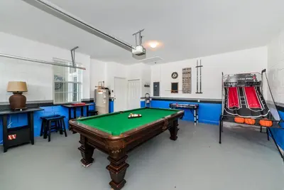 a billiard room with a pool table in it at Private Pool Home at Windsor Palms Resort in Kissimmee