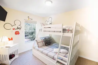 a bedroom with two bunk beds in a room at Private Pool Townhome at Encantada Resort in Kissimmee