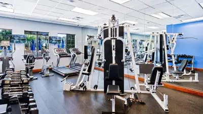 a gym with cardio equipment and tread machines at 3069 Beach Palm in Kissimmee