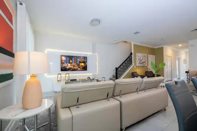 a living room with a couch and chairs at Free Waterpark 5Bd Close to Disney Private Pool 2497 in Kissimmee