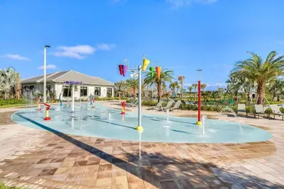 a water park with a bunch of water fountains at Makin Memories Gated Resort Style Community Storey Lake in Kissimmee