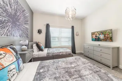 a bedroom with two beds and a window at Disney Dream Home Prime Location Private Pool in Kissimmee