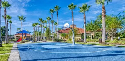 a basketball court at a resort with palm trees at Serene Stay at Terra Verde Resort by Shine Villas 111 townhouse in Kissimmee