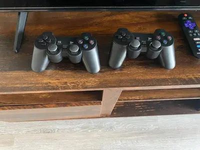 a group of video game controllers sitting on a table at Orlando Retreat 2B2B / Disney-Universal-SeaWorld in Orlando