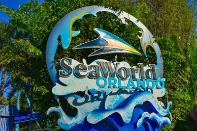 a sign for seaworld orlando with a wave on it at Orlando Retreat 2B2B / Disney-Universal-SeaWorld in Orlando