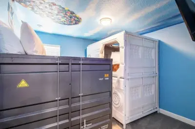 a room with a bed and a ceiling at Enchanting a Magical Orlando Trip in Kissimmee