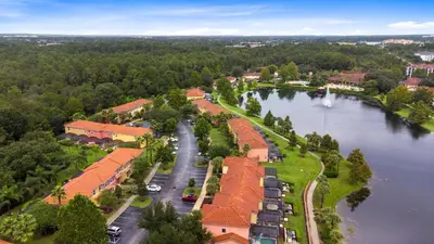 an aerial view of a village on a river at Amazing Townhouse close to Disney 2 Bed 2.5 Bath in Kissimmee