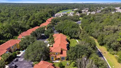 an overhead view of a house with red roof at Disney Area 4 bed/ 3.5 Bathroom Emerald Island in Kissimmee
