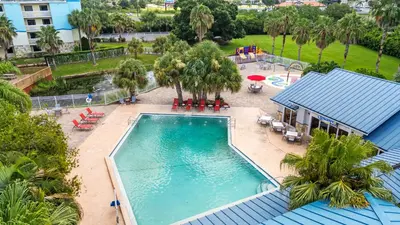 an overhead view of a swimming pool at a resort at Orlando International Drive North Hotel in Orlando