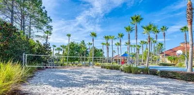a soccer field with palm trees and a goal at Zen Escape At Terra Verde By Shine Villas in Kissimmee