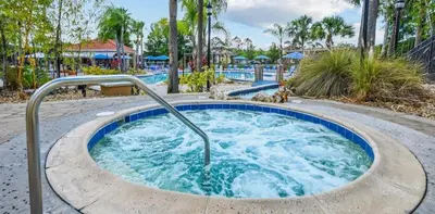 a jacuzzi tub in a pool at a resort at Zen Escape At Terra Verde By Shine Villas in Kissimmee