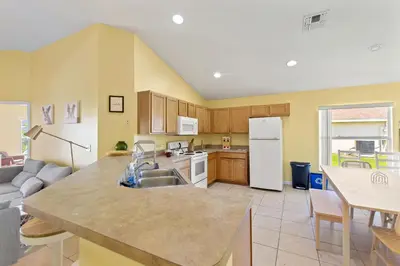 a kitchen with a sink and a counter top at Gilded Parasol By Shine Villas Remington Golf 420 in Kissimmee