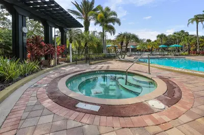 a pool at a resort with a hot tub at Prime Location 3 Suites Townhome Near Universal in Orlando
