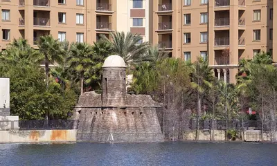 a monument in the water in front of a building at Bonnet Creek Resort 1 Bedroom 1 BA Deluxe Villa in Orlando