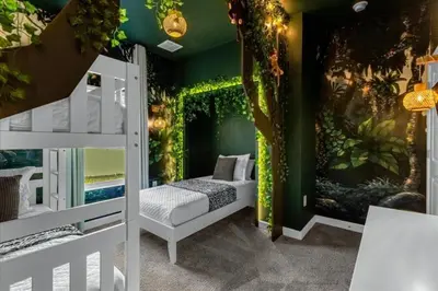 a kids bedroom with an aquarium wall at 5 Bedrooms 4 Bathrooms Storey Lake 2533 Rt in Kissimmee