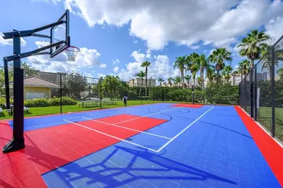 a basketball court with a basketball hoop at 3 Bedrooms 2 Bathrooms Vista Cay 4024-203 Bd in Orlando