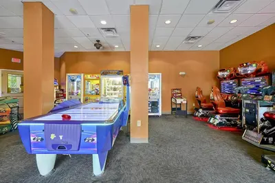 a room with a pinball game in a store at International Drive Luxury Condo in Orlando