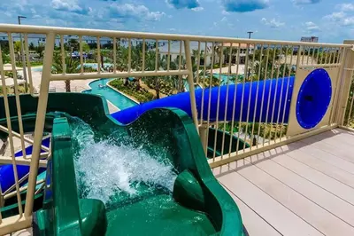 a slide at a water park at a resort at Fancy Family Home 10min-Disney Private Pool STL108 in Kissimmee
