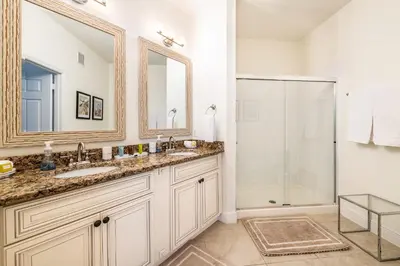 a bathroom with a sink and a shower at Top Floor*Balcony*VistaCay Convention Ctr & Idrive in Orlando