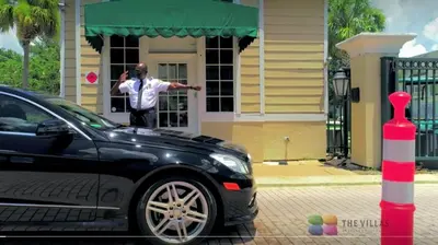 a man taking a picture of a car in front of a house at Your home 5 * near Disney in Kissimmee