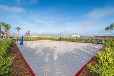 a playground with a red and blue at 3121-304FR STOREY LAKE, CONDO 2/2 LAKE VIEW in Kissimmee