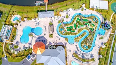 an overhead view of a pool at a resort at 3141-307DM STOREY LAKE, CONDO 2/2 LAKE VIEW in Kissimmee