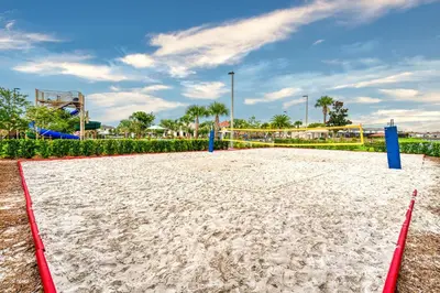 an empty volley ball court at a playground at Last Minute Disney Getaway Private Pool Themed Bedrooms. Book Now 17142 in Kissimmee