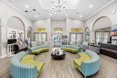a large room with couches and chairs in a store at Epic Location 3BR Home w Full Comfort in Orlando