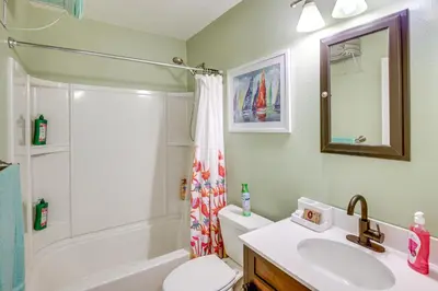 a bathroom with a sink and a toilet and a shower at Patio and Grill Idyllic Sorrento Vacation Home! in Sorrento