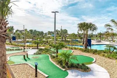 a golf course at a resort with a putting green at Lovely Family Home - 8 Min to Disney! - STL106 in Kissimmee