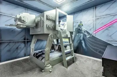a room with a captain america themed room with a bed and avenge at 30-Guest Home w Theme Rooms Games Resort Access in Kissimmee