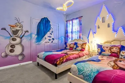 a disney bedroom with two beds and a snowman mural at 30-Guest Home w Theme Rooms Games Resort Access in Kissimmee