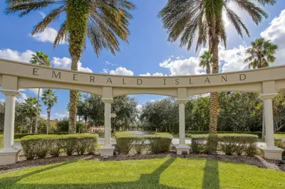 a gazebo in a park with palm trees at Esmerald Island Resort Oasis: Your Perfect Getaway Near Disney in Kissimmee
