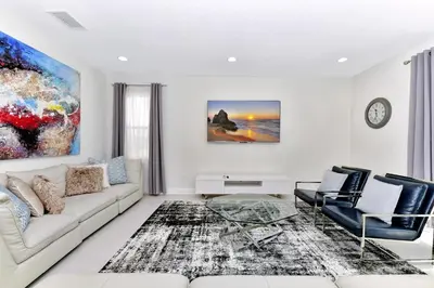 a living room with a white couch and chairs at Cheerful Home Near Disney With Private Pool, Themed Rooms And Waterpark & Resort Access At Encore Resorts Reunion - 7394Mr in Kissimmee