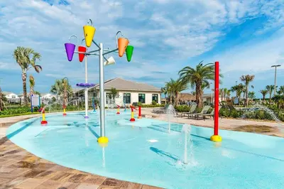 a fountain with water fountains in a park at Amazing 6Bdrms At Storey Lake- Close to Disney in Kissimmee