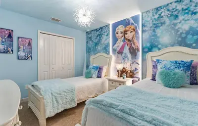 a bedroom with two beds and a disney princess mural at Amazing 6Bdrms At Storey Lake- Close to Disney in Kissimmee