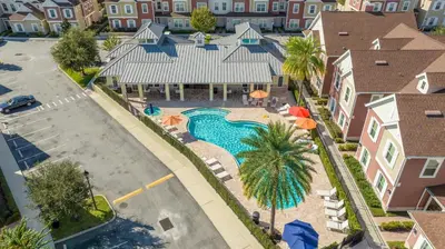 an aerial view of a resort with a swimming pool at Cozy 2024 New 3 Suites 5 min to Disney in Orlando