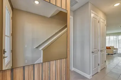a hallway with a built in closet in a house at Last Minute Disney Getaway Private Pool Themed Bedrooms. Book Now 81929 in Orlando