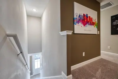 a hallway of a home with a painting on the wall at Last Minute Disney Getaway Private Pool Themed Bedrooms. Book Now 87413 in Orlando