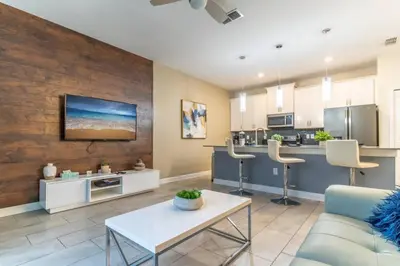 a living room with a couch and a table at Storey Lake Resort 1020 - Hosted by Top Villas in Kissimmee